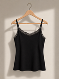 Black lace camisole on wooden hanger