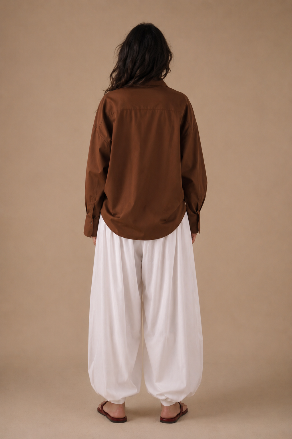 Brown relaxed shirt with white balloon pajama, back view