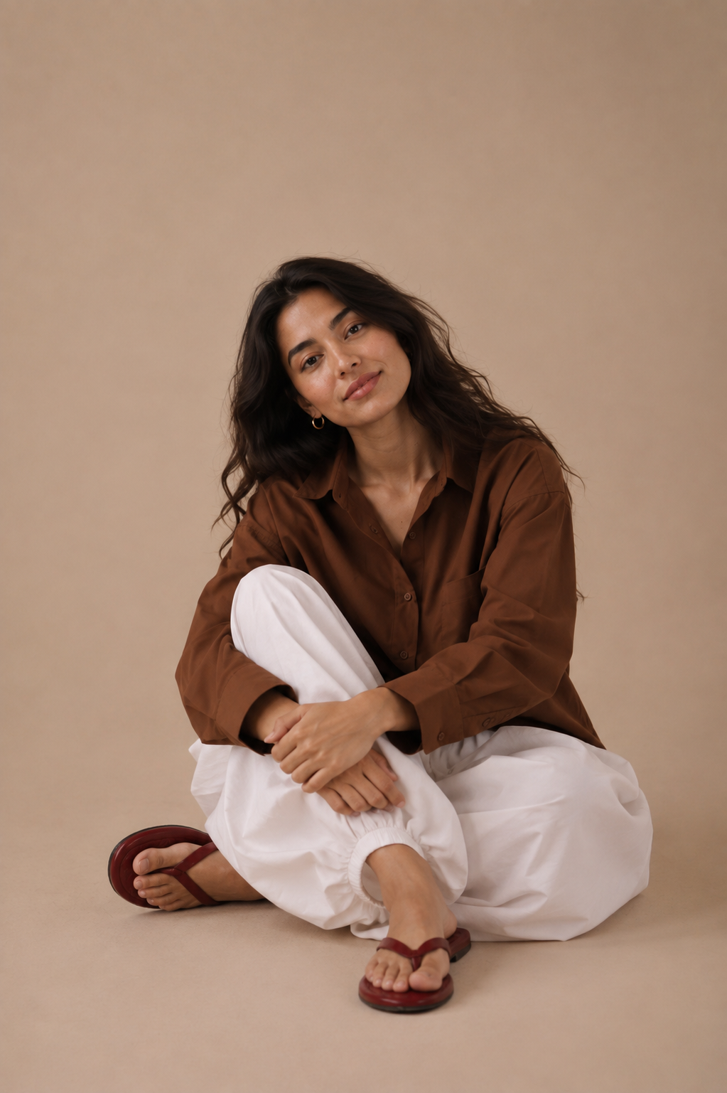Brown relaxed shirt with white balloon pajama, seated styling