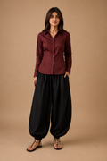 Burgundy shirt with black balloon pajama, front view