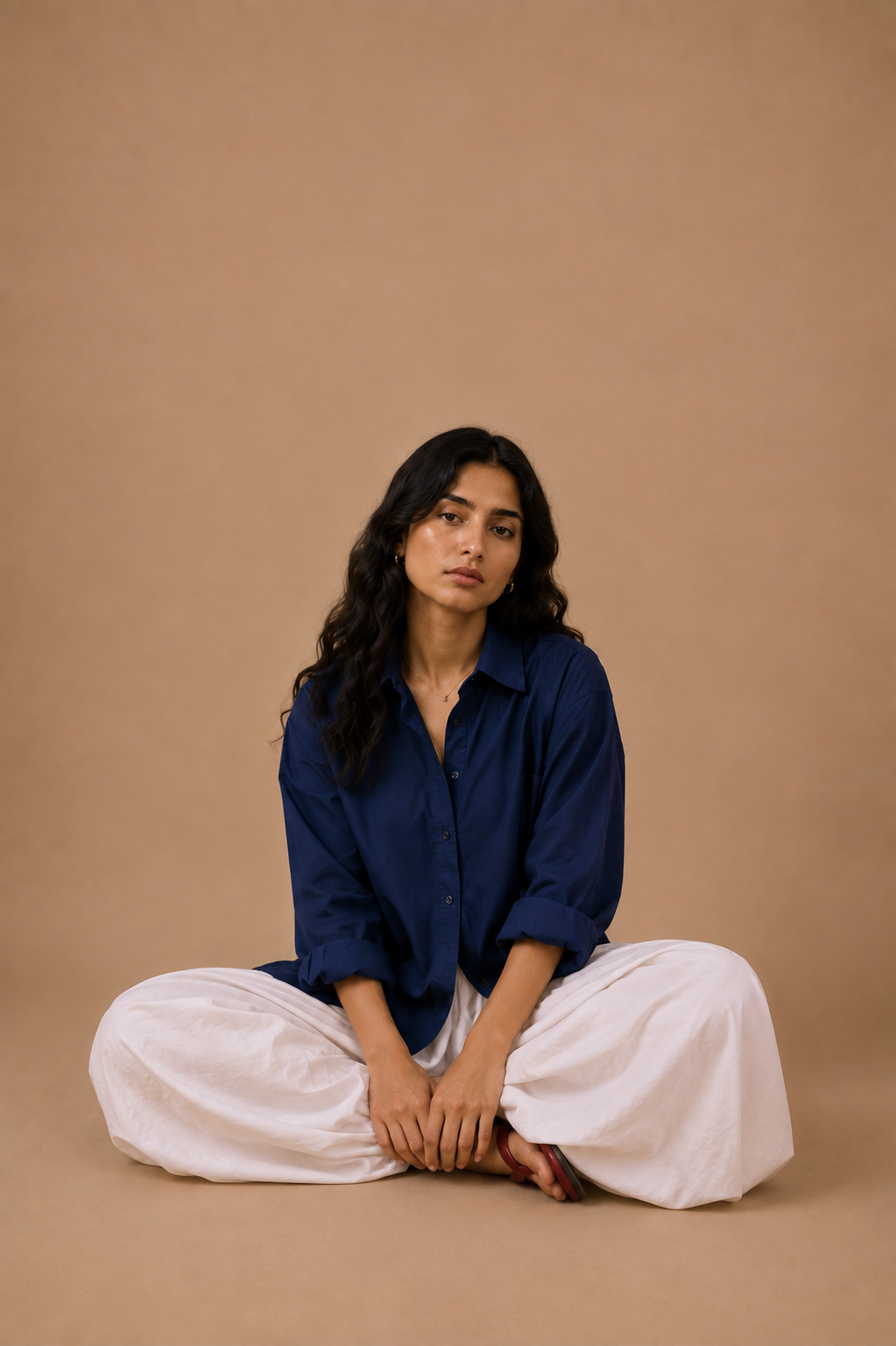Navy relaxed shirt with white balloon pajama, seated styling