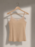 Nude lace camisole on wooden hanger